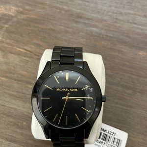 Unisex slim runaway black-tone stainless steel bracelet watch